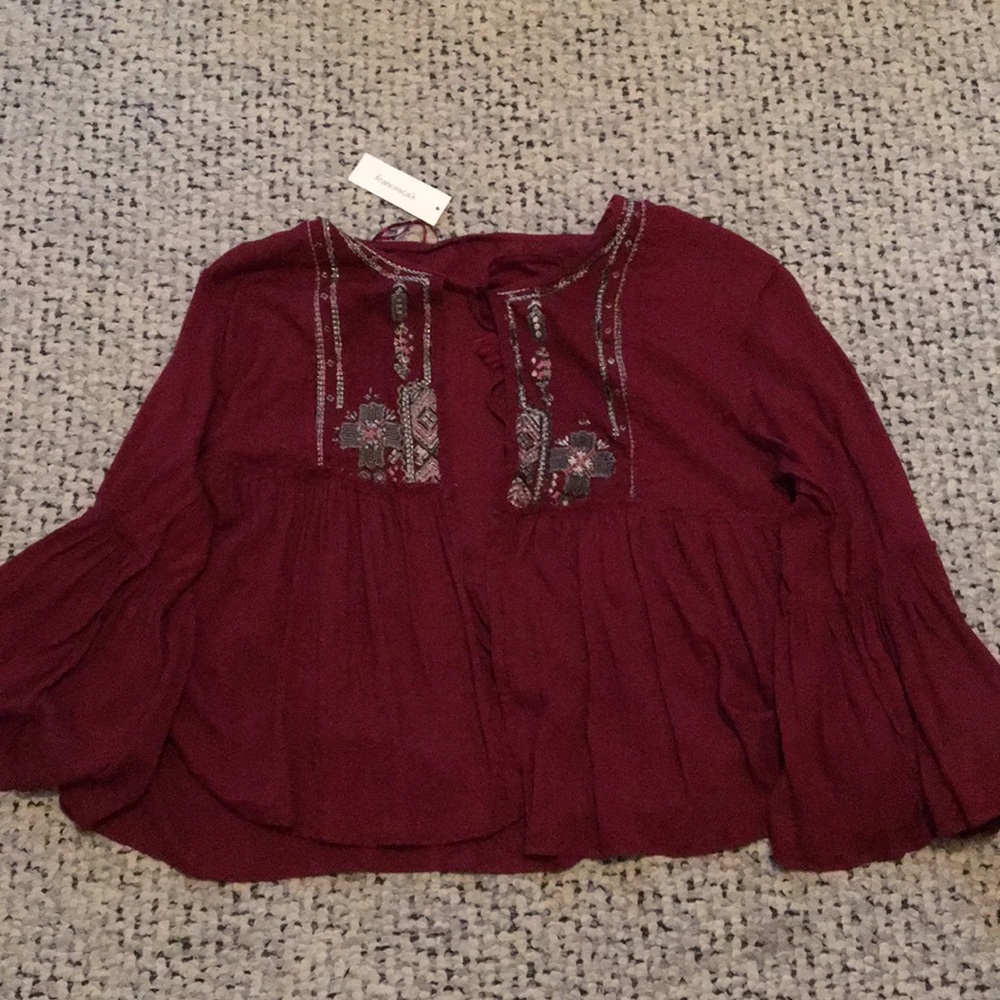 A long, wide sleeved cardigan